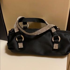 NWOT barrel roll evening bag. Embellished handles